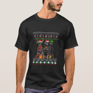 T-shirt Lampes d'arbre de Noël de Père Noël Doberman