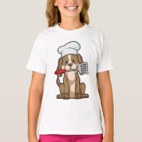 Le chien cuisinier avec le casquette et la spatule