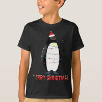 Lumières des arbres de Noël de pingouin mignon