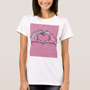 T-shirt Mains du coeur sur Arrière - plan rose