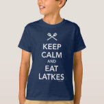 T-shirt Maintenez calme et mangez des Latkes<br><div class="desc">Un excentrique mais s'approprie parfaitement la conception pour Hanoukka : "Maintenez calme et mangez des Latkes."</div>