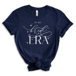 T-shirt Mariage de l'époque de la mariée<br><div class="desc">Entrez dans votre journée spéciale avec style et flair portant notre T-shirt Era Mariée! Conçu avec un tissu doux et confortable et décoré d'un design élégant de l'époque de la Mariée, c'est le vêtement parfait pour les douches nuptiales, les soirées bachelorette, ou simplement célébrer votre fiançailles. Montrez votre esprit de...</div>