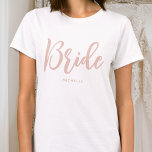 T-shirt Mariage de mariée Nom personnalisé Dusty rose blan<br><div class="desc">Célébrez la future mariée avec un t-shirt personnalisé unique ! Un design simple et élégant, avec des lettres de script tendance, personnalisées avec le nom de la mariée, la date mariage, l'emplacement ou autre texte. Ce élégant t-shirt rose et blanc poussiéreux fait un joli cadeau pour une soirée bachelorette, un...</div>
