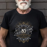 T-shirt Mens Funny Whiskey 80e anniversaire<br><div class="desc">Célébrez le grand 8-0 avec style et humour avec ce design d'anniversaire au whisky vintage d'inspiration étiquette. La typographie noir, or et blanc est ornée et élégante, lui conférant une atmosphère rétro vintage classique. Parfait pour l'homme (ou la femme !) dans votre vie qui aime leur scotch, les esprits, le...</div>