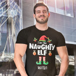 T-shirt Naughty elf famille correspondant nom de la tenue<br><div class="desc">Entrez dans l'esprit de vacances avec ce t-shirt Naughty elf humoristique qui fait partie d'une collection d'elfes de famille assortie contenant des cadeaux pour n'importe quel membre de la famille. Parfait pour toute réunion de famille de Noël, ce t-shirt est doté d'un casquette elfe mignon et de jambes amusantes, avec...</div>