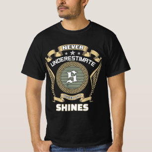 T-shirt Ne sous-estimez jamais le pouvoir d'un SHINES