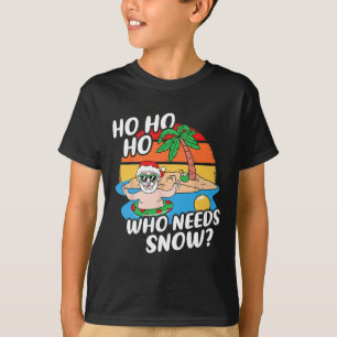 T-shirt Noël en juillet Funny Santa surfant sur la plage d