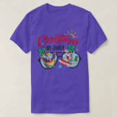 T-shirt Noël En Juillet Plage Flamant rose Père Noël Surf  (Design devant)