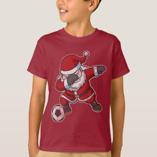 T-shirt Noël tamponnant le football du père noël