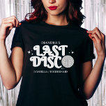 T-shirt Nom de la discothèque dernière Retro Silver les an<br><div class="desc">Dernière discothèque les années 70 style bachelorette de soirée t-shirt. Shirt dispose de boule disco et de police rétro noir et argent avec texte dernier disco. Cliquez sur personnaliser pour ajouter vos noms et vos détails ou modifier dans l'outil de conception pour une modification ultérieure.</div>