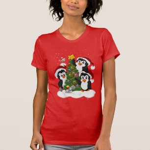 T-shirt Penguins de Noël autour de l'arbre de Noël