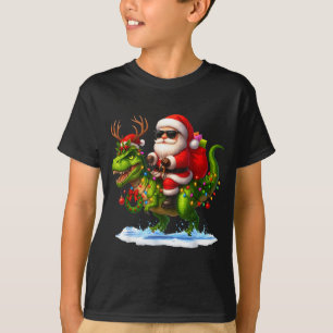 T-shirt Père Noël à cheval sur un dinosaure T Rex Noël Gar