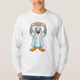 T-shirt Pingouin comme docteur avec plâtre