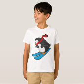 T-shirt Pingouin comme skieur avec ski (Devant entier)