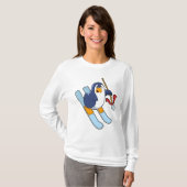 T-shirt Pingouin comme skieur avec ski (Devant entier)