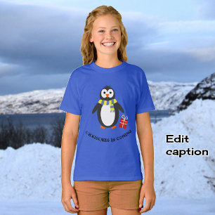 T-shirt Pingouin d'hiver mignon jouant