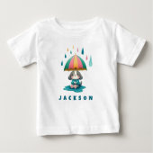 T-shirt Pour Bébé Marionnette mignonne avec parapluie assise dans un (Devant)