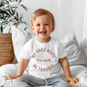 T-shirt Pour Bébé Mon sourire me garde hors des ennuis