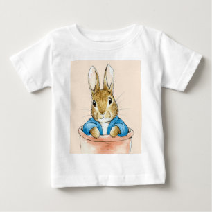 T-shirt Pour Bébé Pierre le lapin assis dans un pot