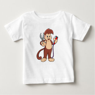 T-shirt Pour Bébé Singe comme coiffeur avec ciseaux et razor