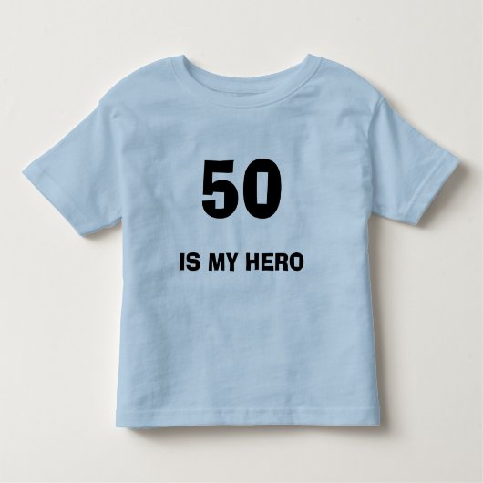 T-SHIRT POUR LES TOUS PETITS 50, EST MON HÉROS (Devant)