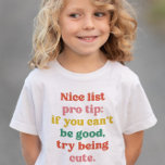 T-shirt Pour Les Tous Petits Belle liste joli joli Noël coloré drôle<br><div class="desc">Ce joli et coloré petit-tout et enfants design chemise de Noël comprend les mots "Nice liste pro conseil : si vous ne pouvez pas être bon,  essayez d'être mignon." C'est un design amusant,  drôle et festif dans un texte ludique et fait un grand cadeau.</div>