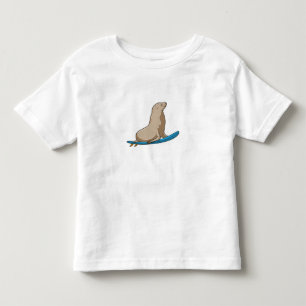 T-shirt Pour Les Tous Petits Sceau comme surfeur avec Surfboard