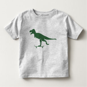 T-shirt Pour Les Tous Petits T Rex sur une chemise de planche à roulettes