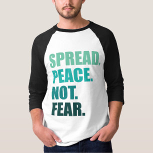 T-shirt Propager la paix ne craignez pas le texte vert Hom