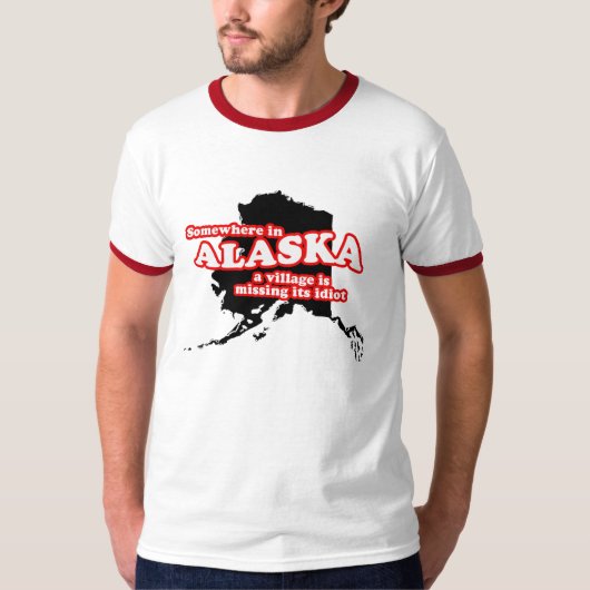 T-shirt Quelque part en Alaska un village manque son idiot (Devant)