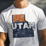 T-shirt Retro Voyage Iconique Utah Graphisme<br><div class="desc">Célébrez l'État de la ruche avec ce T-shirt Iconique Utah Graphic Voyage rétro. Doté d'un design d'inspiration vintage qui saisit les paysages magnifiques et le charme unique de l'Utah, ce T-shirt est parfait pour les voyageurs comme pour les résidents. Fabriqué avec des matériaux de haute qualité pour un ajustement confortable,...</div>