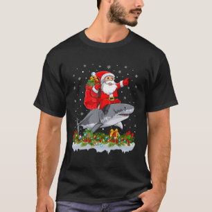 T-shirt Santa Claus chevauchant grand requin blanc