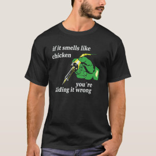 T-shirt Si ça sent le poulet, vous le tenez mal