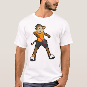 T-shirt Singe comme joueur de tennis avec raquette de tenn