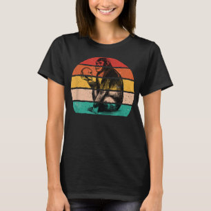 T-shirt Singe Vintage rétro tenant le crâne