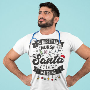 T-shirt Sois gentil avec l'infirmière Père Noël regarde No