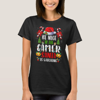 T-shirt Soyez gentil avec le joueur Père Noël regarde Noël