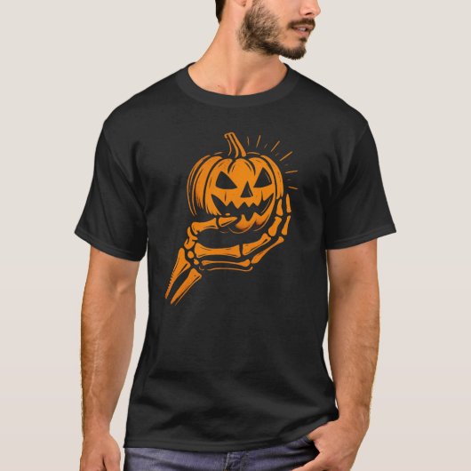 T-shirt Squelette éffrayant tenant la main Jack-O'Lantern (Devant)