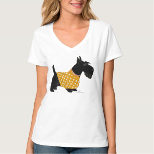 T-shirt Térrier écossais en pull-over doré allongé sur