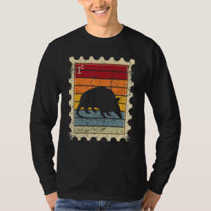 T-shirt Timbre-poste avec un tatou au coucher du soleil