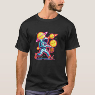T-shirt Un astronaute joue à la balle avec des planètes da
