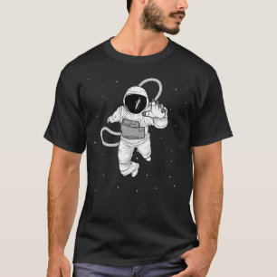T-shirt Un Astronaute Volant Dans L'Espace Avec Des Étoile