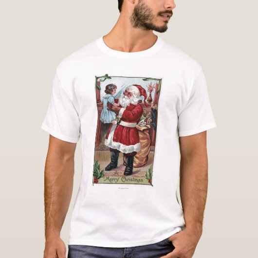 T-shirt Un joyeux ChristmasSanta tenant la fille dans le (Devant)
