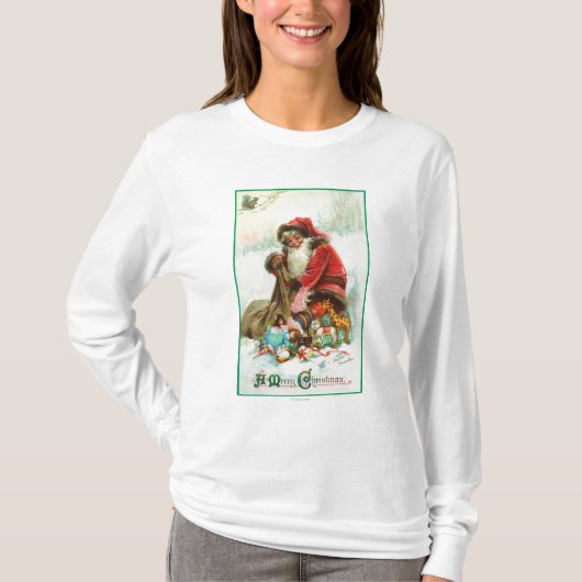 T-shirt Un Joyeux Noël Père Noël emballant des jouets dans (Devant)
