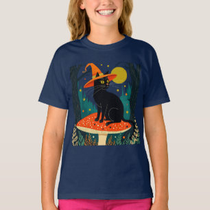 T-shirt Un petit chat noir de sorcière assis sur un champi