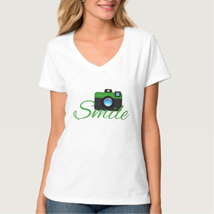 T-shirt vert de photographe d'appareil-photo et de