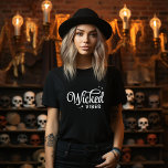 T-shirt Vibes Halloween<br><div class="desc">Apportez un style éffrayant à votre garde-robe avec ces t-shirts et sweatshirts Halloween personnalisés avec un texte retro tendance "Wicked Vibes" graphique. Personnalisez avec votre choix de polices et de couleurs pour un look unique qui est parfait pour les fêtes d'Halloween, les tricks ou les tenues d'automne décontractées. Disponible dans...</div>