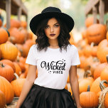 T-shirt Vibes Halloween<br><div class="desc">Apportez un style éffrayant à votre garde-robe avec ces t-shirts et sweatshirts Halloween personnalisés avec un texte retro tendance "Wicked Vibes" graphique. Personnalisez avec votre choix de polices et de couleurs pour un look unique qui est parfait pour les fêtes d'Halloween, les tricks ou les tenues d'automne décontractées. Disponible dans...</div>