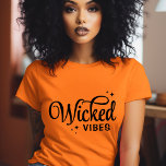 T-shirt Vibes Halloween<br><div class="desc">Apportez un style éffrayant à votre garde-robe avec ces t-shirts et sweatshirts Halloween personnalisés avec un texte retro tendance "Wicked Vibes" graphique. Personnalisez avec votre choix de polices et de couleurs pour un look unique qui est parfait pour les fêtes d'Halloween, les tricks ou les tenues d'automne décontractées. Disponible dans...</div>