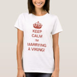 T-shirt Vintage Gardez le calme Je marie un viking !<br><div class="desc">Illustration vintage Français Gardez le calme et continuez sur le design modifié pour que la nouvelle mariée soit ! Restez calme Je marie un viking ! Complète avec une couronne royale, chaque mariée devrait ressembler à une princesse ! Félicitation ! Une façon amusante de faire savoir à vos amis et à...</div>